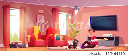 Kid boy playing with dachshund dog at home Kid boy playing with dachshund dog at home 115464310