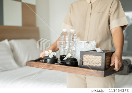 The housekeeper hotel cleans and arranges things in order. prepares to welcome VIP guests 115464378