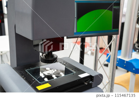 Optic machine for precise measurement of part size and quality evaluation. Smart factory.. 115467135