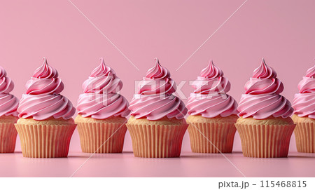 Minimalistic group pink holiday cupcakes lined up row with smooth frosting in light pastel colors 115468815