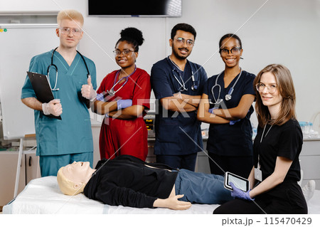Medical Students Practicing CPR During Training 115470429