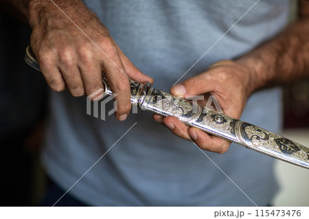 Silver blade scabbard, handmade, the process of creation. Silver blade scabbard, handmade, the process of creation. 115473476