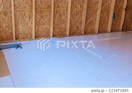 In new house inside, expanding polystyrene is installed for floor thermal insulation In new house inside, expanding polystyrene is installed for floor thermal insulation 115473885