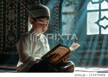 A little Muslim boy sits quietly, reading the holy book Quran. The importance of early religious education and spiritual development. Generative AI. 115474989