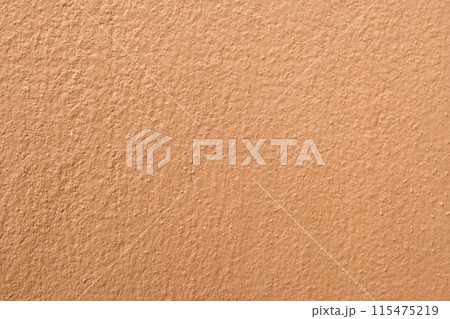 Brown cement wall background close up Brown cement wall background close up 115475219