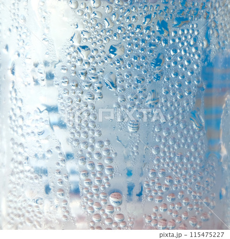 Water droplets texture on blue background Water droplets texture on blue background 115475227