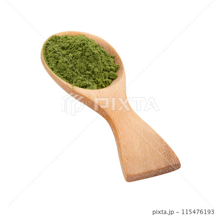 matcha green tea powder in wood spoon on white background matcha green tea powder in wood spoon on white background 115476193