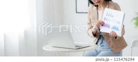 Young asian business woman using laptop computer for video conference online. 115476294