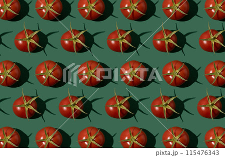 Tomatoes pattern. Red cherry tomato on a green background. Vegetables food concept. Tomatoes pattern. Red cherry tomato on a green background. Vegetables food concept. 115476343
