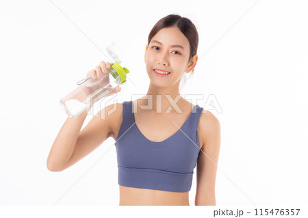 Fit portrait young asian woman smile taking a break from workout holding a clear water bottle. 115476357