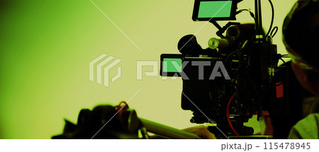Filmmaker crew team with professional cinema equipment and video camera on the set. Film director and crew making commercial content advertising in studio. Technique of modern filming and advertising. Filmmaker crew team with professional cinema equipment and video camera on the set. Film director and crew making commercial content advertising in studio. Technique of modern filming and advertising. 115478945