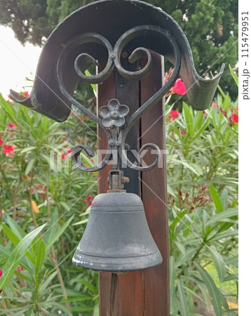 small bell with flowers in a garden small bell with flowers in a garden 115479951