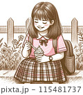 笑顔でお菓子を食べる女の子 115481737