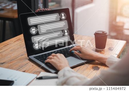 Chat GPT concept, Businesswoman using laptop computer on desk with Chat GPT icon on virtual screen, Chat with AI or Artificial Intelligence, chatbot developed by OpenAI. 115484972