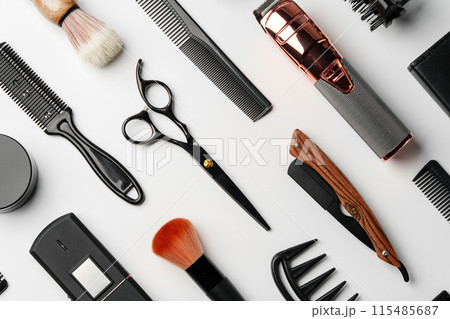 Pattern of various shaving and bauty care accessories for men on gray background Pattern of various shaving and bauty care accessories for men on gray background 115485687