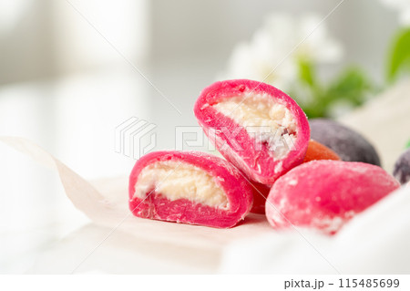 Multi-colored Japanese cakes Mochi in a white plate Multi-colored Japanese cakes Mochi in a white plate 115485699