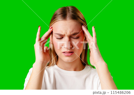 Young Woman Holding Head With Hands Headache Concept 115486206