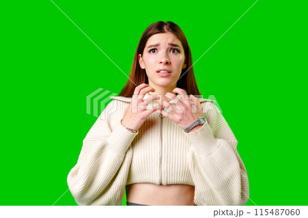 Woman in White Sweater Making Gesture Woman in White Sweater Making Gesture 115487060