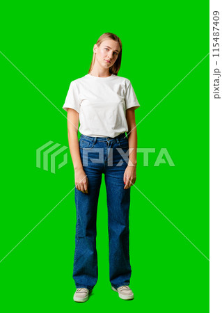 Woman in White Shirt and Jeans Posing for Picture 115487409