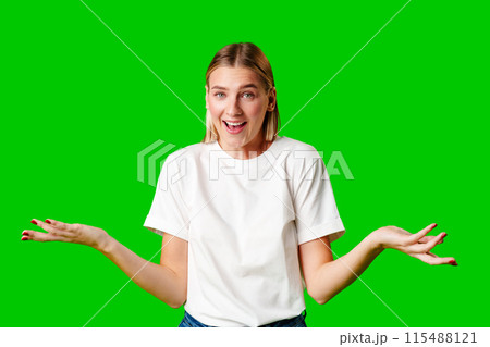 Young Woman in White T-shirt Making a Surprised Face Young Woman in White T-shirt Making a Surprised Face 115488121