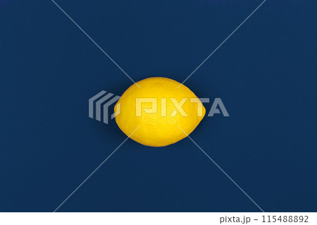 Lemon fruit on classic blue background top view 115488892