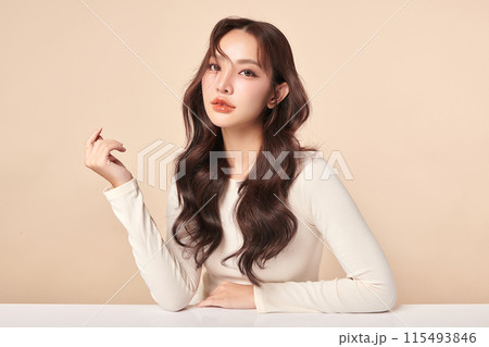 Beautiful young asian woman with clean fresh skin on beige background, Face care, Facial treatment, Cosmetology, beauty and spa, Asian women portrait. Beautiful young asian woman with clean fresh skin on beige background, Face care, Facial treatment, Cosmetology, beauty and spa, Asian women portrait. 115493846