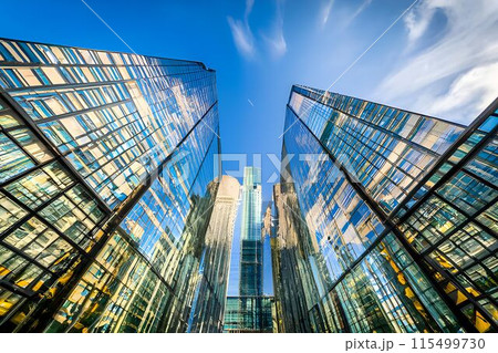 a very tall glass skyscraper a very tall glass skyscraper 115499730