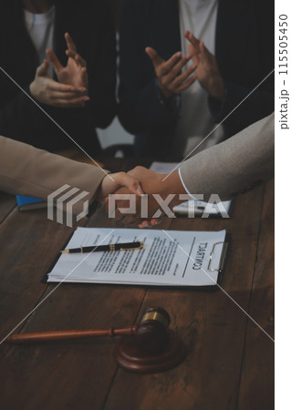 Judge gavel with Justice lawyers having team meeting at law firm background. Concepts of Law and Legal services. Judge gavel with Justice lawyers having team meeting at law firm background. Concepts of Law and Legal services. 115505450