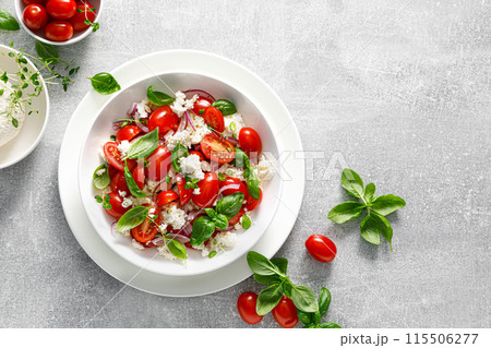Salad of tomato, ricotta cheese and basil, top view Salad of tomato, ricotta cheese and basil, top view 115506277