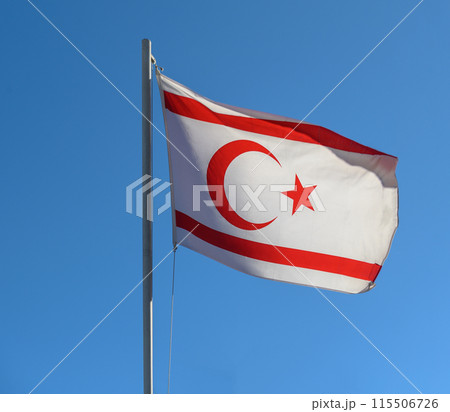 National flag of Turkish Republic of Northern Cyprus on a flagpole National flag of Turkish Republic of Northern Cyprus on a flagpole 115506726