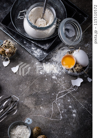 Baking ingredients with flour and eggs 115510572