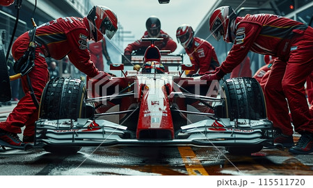 Formula One Pit Stop Team in Action 115511720