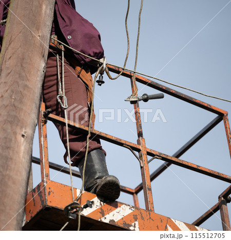 electrical pole maintenance and repair using a hydraulically powered bucket boom lift. electrical pole maintenance and repair using a hydraulically powered bucket boom lift. 115512705