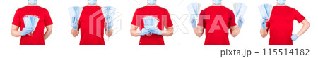 Man in red t-shirt holding disposable face masks isolated white background Man in red t-shirt holding disposable face masks isolated white background 115514182