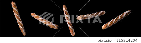 Set of fresh baked bread and French rye baguette isolated on black background 115514204