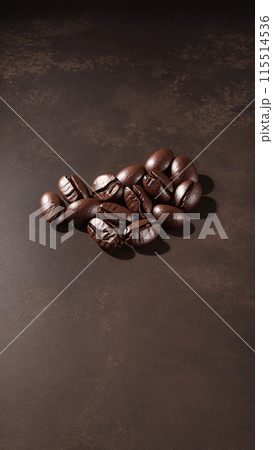 coffee beans on dark background coffee beans on dark background 115514536