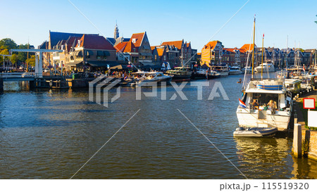 View of Hoorn city port on lake Markermeer with moored pleasure boats View of Hoorn city port on lake Markermeer with moored pleasure boats 115519320