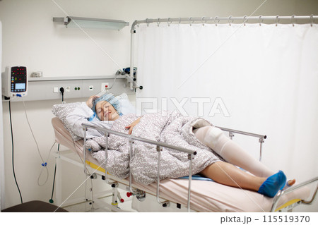 Young woman in hospital recovery room after surgery Young woman in hospital recovery room after surgery 115519370