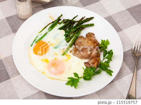 Roasted rabbit liver with fried eggs and asparagus Roasted rabbit liver with fried eggs and asparagus 115519757