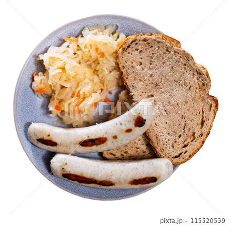 Fried sausages served with pickled cabbage Fried sausages served with pickled cabbage 115520539