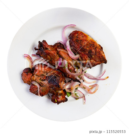 Traditional european dish Shashlik cordero - fried lamb kebab with onion on plate 115520553