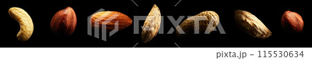 Group of nuts isolated on black background. Close-up Group of nuts isolated on black background. Close-up 115530634