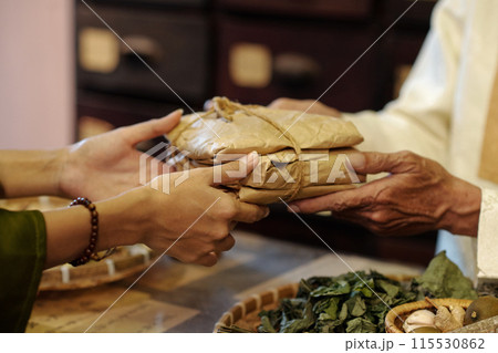 Customer Buying Herbs In Drug Store Customer Buying Herbs In Drug Store 115530862