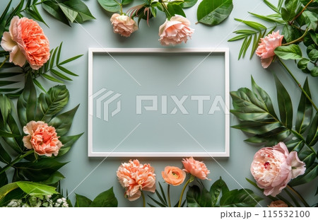 White Picture Frame Surrounded by Pink and White Flowers and Green Leaves 115532100
