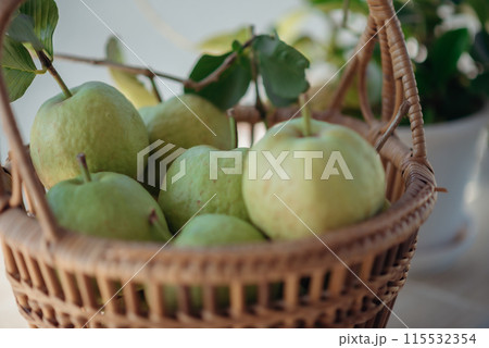 A basket of ripe guavas, a tropical fruit with a sweet aroma. 115532354