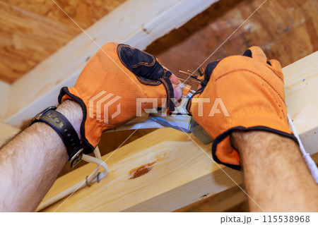 Installation of power junction box for LED recessed ceiling lights in new home Installation of power junction box for LED recessed ceiling lights in new home 115538968