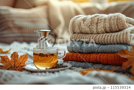Warm Autumn Day With Tea and Knitted Sweaters 115539314