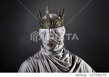 Ghost of a queen or king over dark misty background 115540179