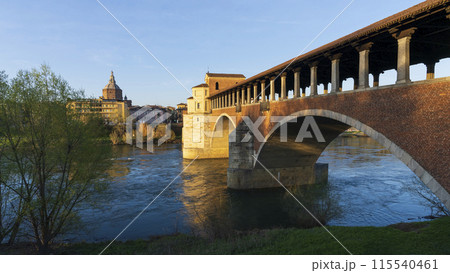 Nice shot of covered bridge and Pavia Cathedral at sunny day Nice shot of covered bridge and Pavia Cathedral at sunny day 115540461