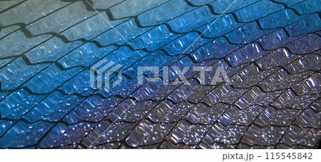 Transparent, iridescent water in the pool.There are ripples on the surface of the water, distorting the bottom of the pool. 115545842